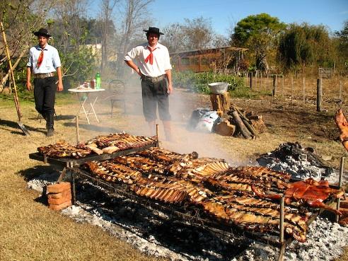 Gauchos grilling Argentine beef cuts