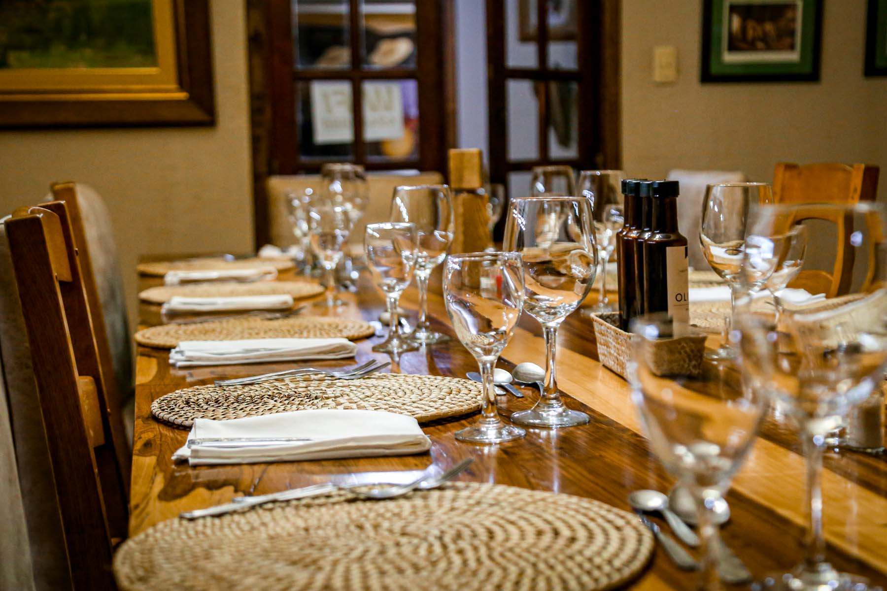 Luxurious table setting with fine dishware prepared at Alijilan Lodge, Argentina, offering an unforgettable dining experience after a dove hunting day with C&C Outfitters
